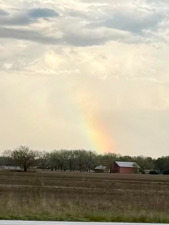 Beautiful rainbow and sunset on the way home from soccer practice tonight. And the guy behind the camera.